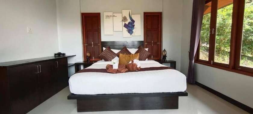 Imagen de la habitación del Hotel Baan Puteri Lanta Villa. Foto 24