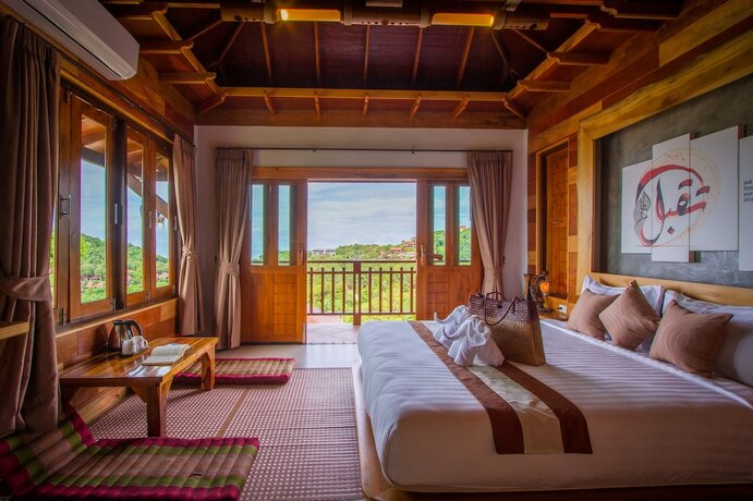 Imagen de la habitación del Hotel Baan Puteri Lanta Villa. Foto 31