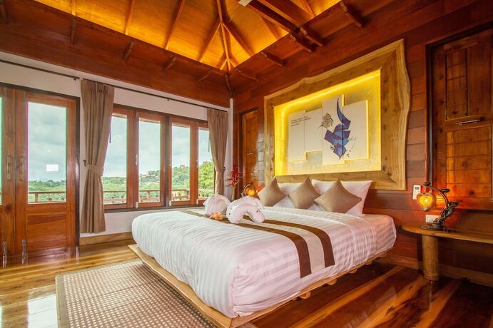 Imagen de la habitación del Hotel Baan Puteri Lanta Villa. Foto 38