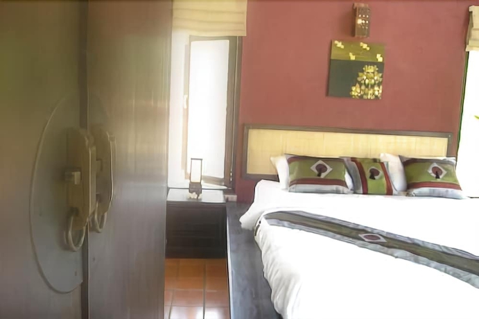 Imagen de la habitación del Hotel Baan Rai Lanna Resort. Foto 5