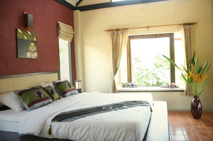 Imagen de la habitación del Hotel Baan Rai Lanna Resort. Foto 7