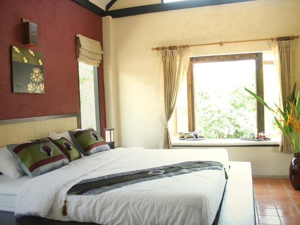 Imagen de la habitación del Hotel Baan Rai Lanna Resort. Foto 11