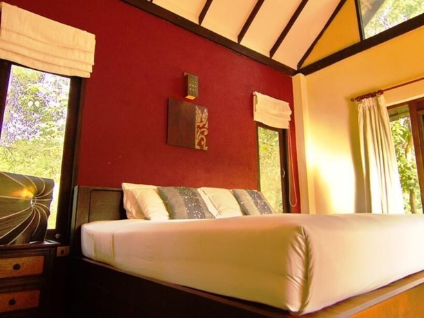 Imagen de la habitación del Hotel Baan Rai Lanna Resort. Foto 12