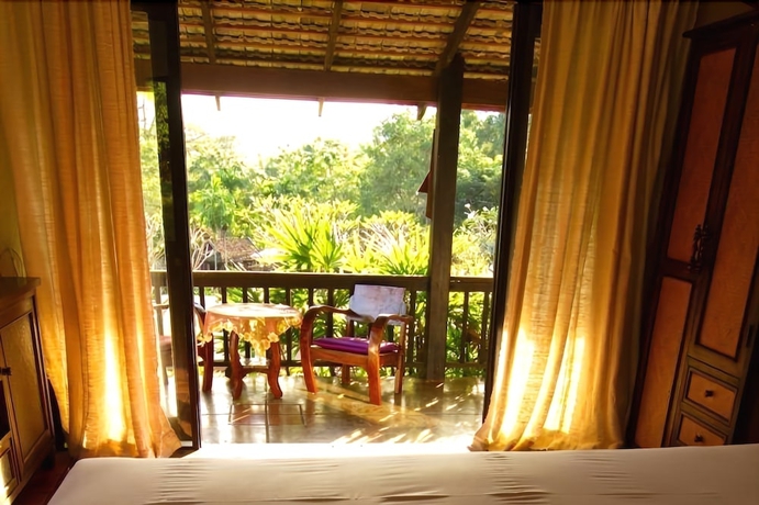 Imagen de la habitación del Hotel Baan Rai Lanna Resort. Foto 14