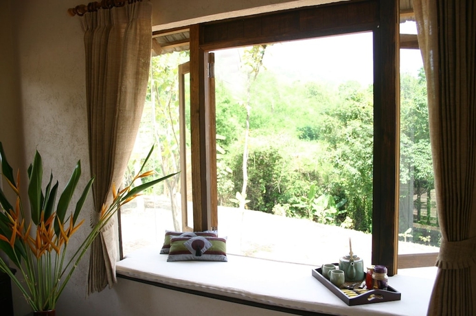 Imagen de la habitación del Hotel Baan Rai Lanna Resort. Foto 16