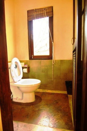 Imagen de la habitación del Hotel Baan Rai Lanna Resort. Foto 17