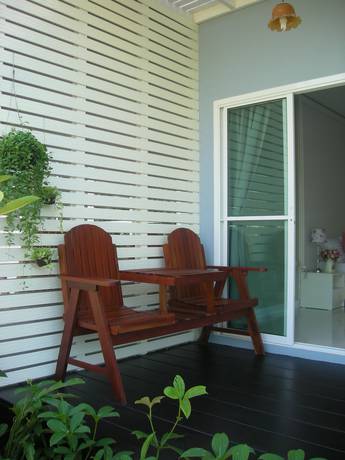 Imagen de la habitación del Hotel Baan Rim Klong Resort. Foto 6