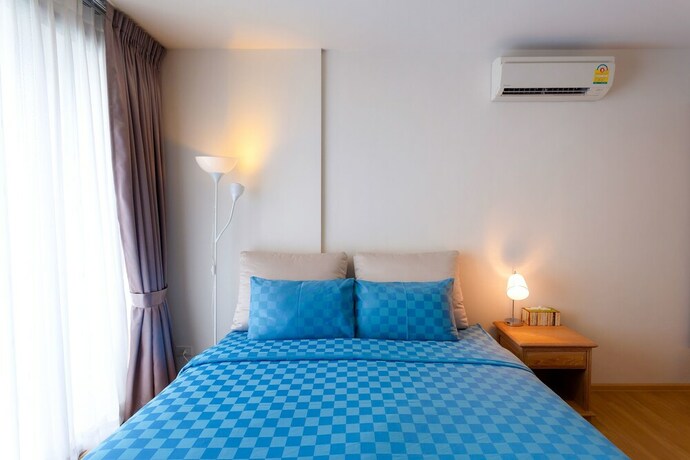 Imagen de la habitación del Hotel Baan Sankraam Beachfront Condominium. Foto 25