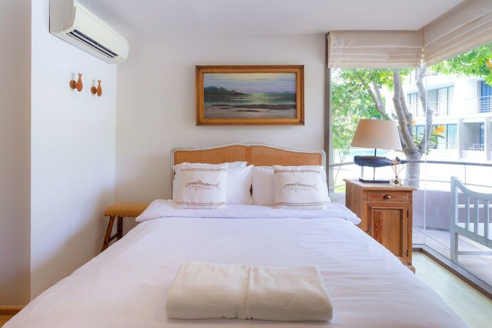 Imagen de la habitación del Hotel Baan Sankraam Beachfront Condominium. Foto 28