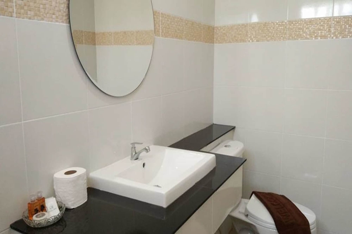 Imagen de la habitación del Hotel Baan Suan Rim Klong. Foto 3