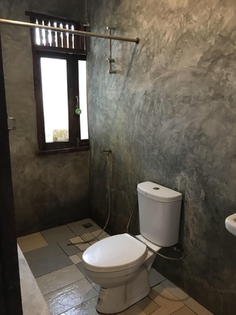 Imagen de la habitación del Hotel Baan Suan Rim Klong. Foto 4
