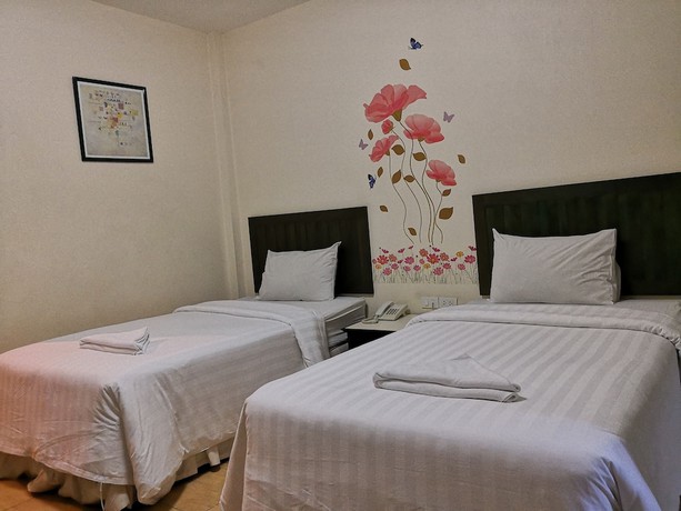 Imagen de la habitación del Hotel Baan Suksiri. Foto 4