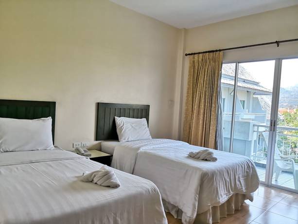 Imagen de la habitación del Hotel Baan Suksiri. Foto 8