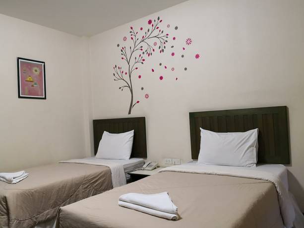 Imagen de la habitación del Hotel Baan Suksiri. Foto 9