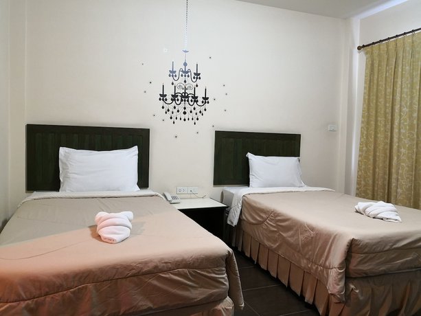 Imagen de la habitación del Hotel Baan Suksiri. Foto 10