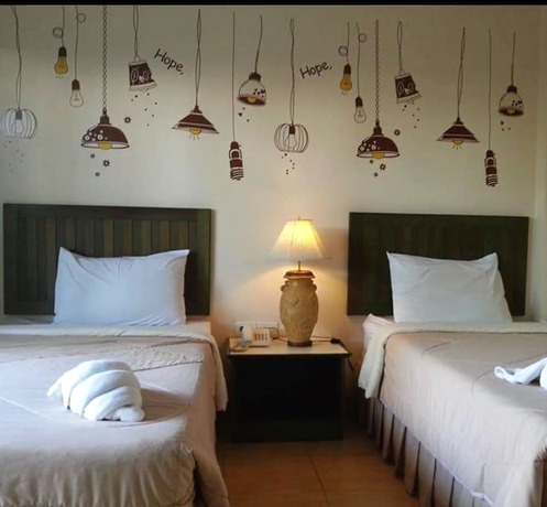 Imagen de la habitación del Hotel Baan Suksiri. Foto 14