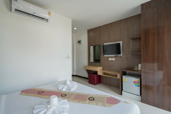 Imagen de la habitación del Hotel Baan Thai Beach Side Residence. Foto 12