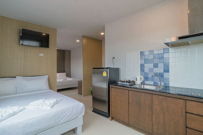 Imagen de la habitación del Hotel Baan Thai Beach Side Residence. Foto 15