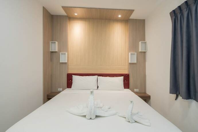 Imagen de la habitación del Hotel Baan Thai Beach Side Residence. Foto 19