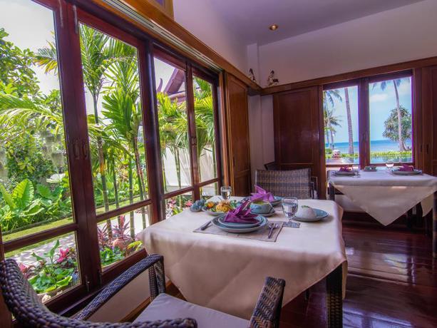 Imagen del bar/restaurante del Hotel Baan Thai Lanta Resort. Foto 6