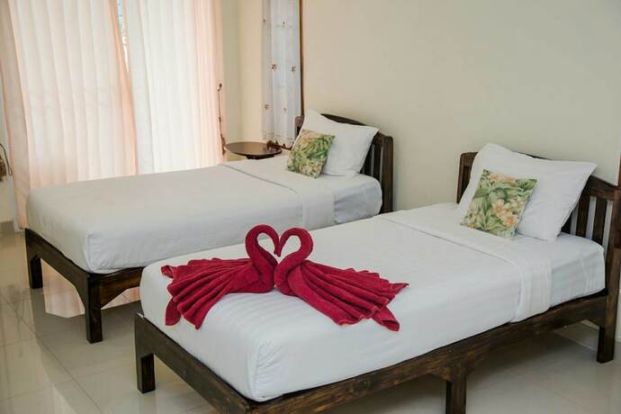 Imagen de la habitación del Hotel Baan Thip. Foto 23