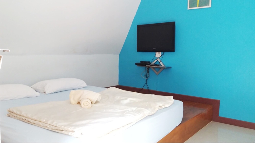 Imagen de la habitación del Hotel Baan Tonmai Resort. Foto 10