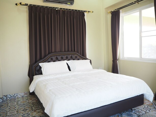 Imagen de la habitación del Hotel Baan Tukta. Foto 21