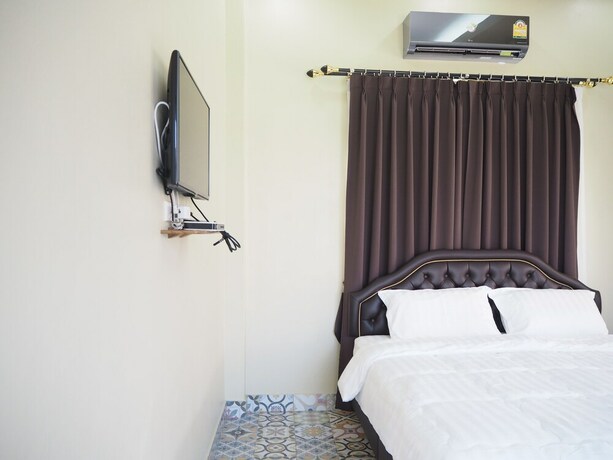 Imagen de la habitación del Hotel Baan Tukta. Foto 32