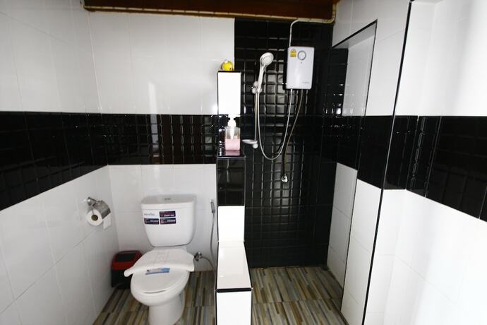 Imagen de la habitación del Hotel Baanchansamut Homestay. Foto 18