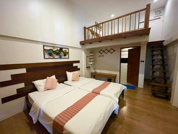 Imagen de la habitación del Hotel Baanchansamut Homestay. Foto 19