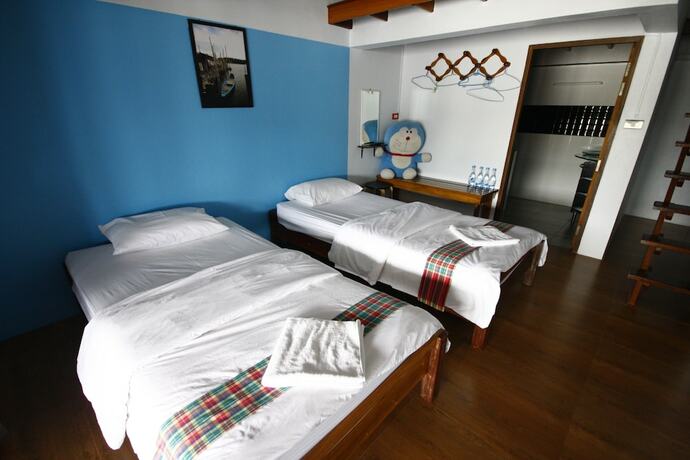 Imagen de la habitación del Hotel Baanchansamut Homestay. Foto 23