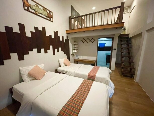 Imagen de la habitación del Hotel Baanchansamut Homestay. Foto 24