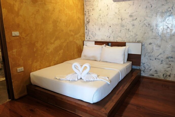 Imagen de la habitación del Hotel Baanchompooamphawa. Foto 19
