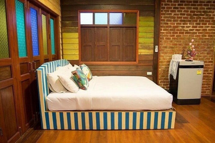 Imagen de la habitación del Hotel Baanchompooamphawa. Foto 23