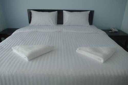 Imagen de la habitación del Hotel Baandoungkamol. Foto 4