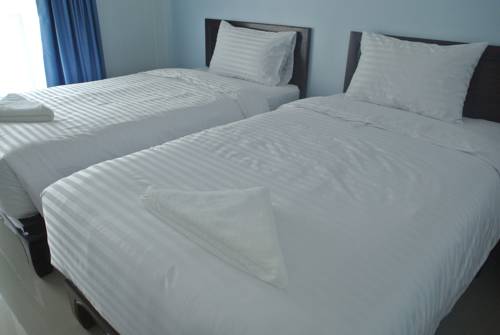 Imagen de la habitación del Hotel Baandoungkamol. Foto 5