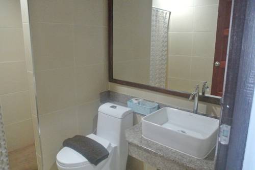 Imagen de la habitación del Hotel Baandoungkamol. Foto 6