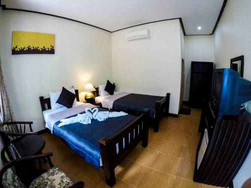 Imagen de la habitación del Hotel Baanmo Resort. Foto 16