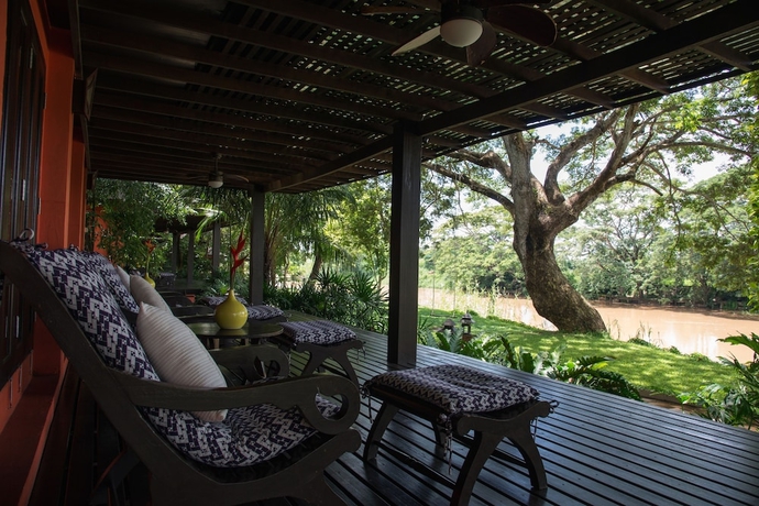 Imagen de la habitación del Hotel Baannamping Riverside Village. Foto 9