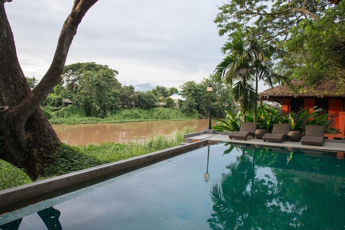 Imagen de la piscina del Hotel Baannamping Riverside Village. Foto 17