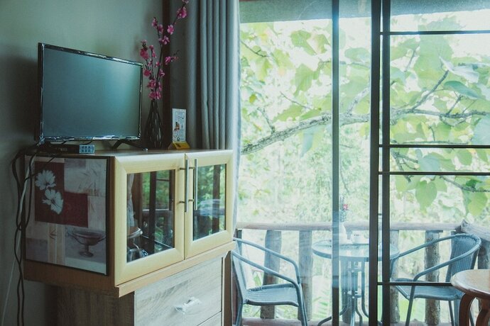 Imagen de la habitación del Hotel Baansuan Chomchun. Foto 12