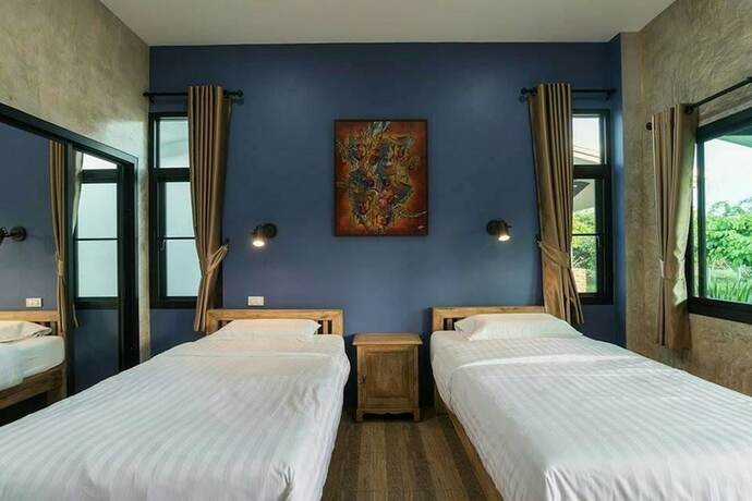 Imagen de la habitación del Hotel Baansuan Tisa Resort. Foto 18