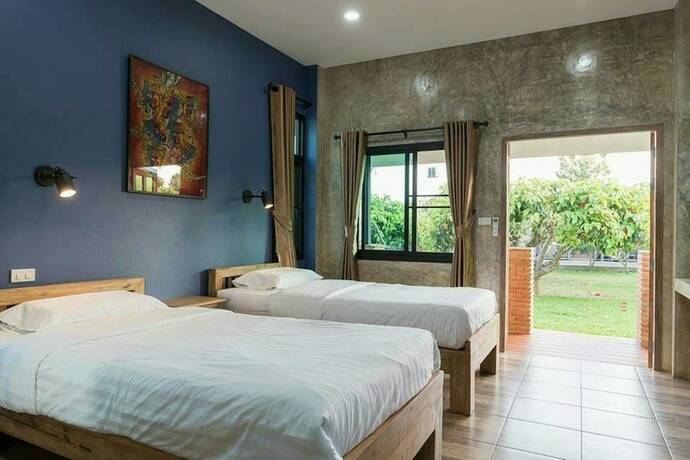 Imagen de la habitación del Hotel Baansuan Tisa Resort. Foto 19
