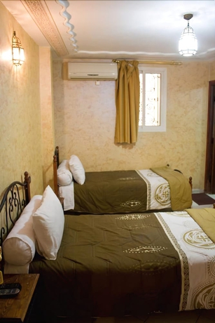 Imagen de la habitación del Hotel Bab Boujloud. Foto 6
