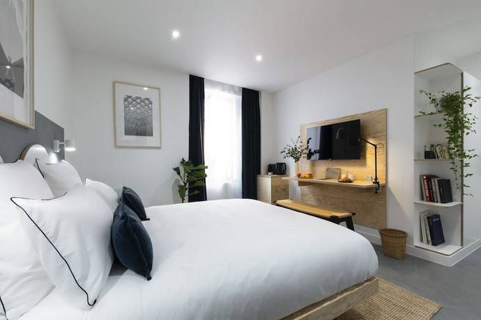 Imagen de la habitación del Hotel Baba, París. Foto 9