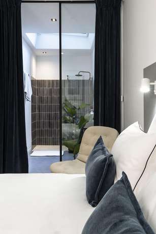Imagen de la habitación del Hotel Baba, París. Foto 12