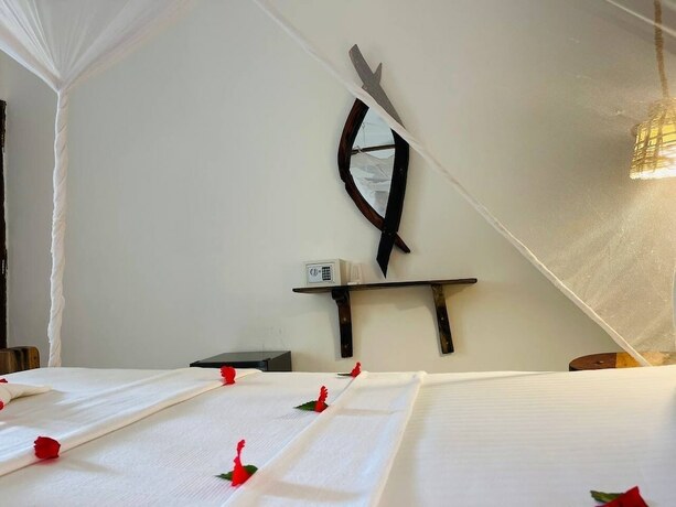 Imagen de la habitación del Hotel Babalao Bungalows. Foto 11