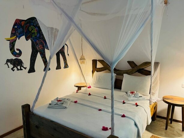 Imagen de la habitación del Hotel Babalao Bungalows. Foto 16