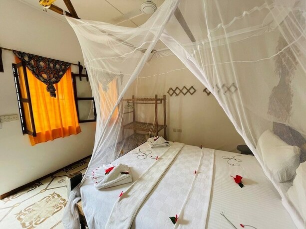 Imagen de la habitación del Hotel Babalao Bungalows. Foto 17