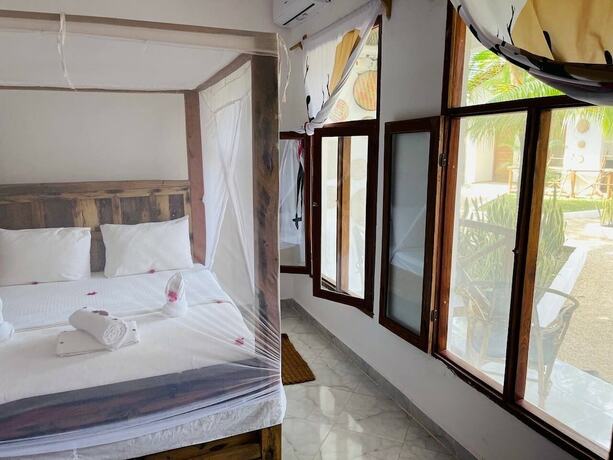 Imagen de la habitación del Hotel Babalao Bungalows. Foto 19
